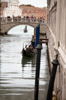 Couple kissing under Bridge of Sighs