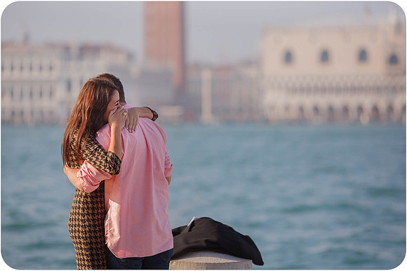 An intimate moment of love and joy following a surprise proposal in Venice.