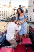 Fiancé proposing on gondola in Venice