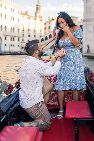 Romantic gondola proposal with Venice skyline