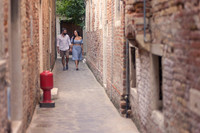 Romantic walk in Venice alley before surprise proposal