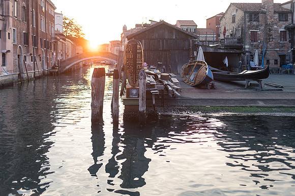 Couple embracing on a gondola in Venice.