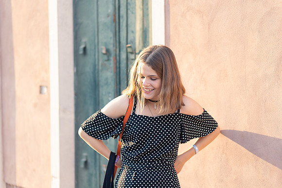Young girl in a dress in Venice.