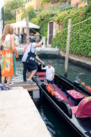 Children by a gondola in Venice.