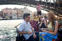 Couple enjoying a moment on a gondola.