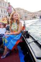 Family bonding on a gondola in Venice.