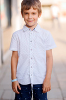 Young boy posing in Venice.