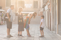 Family strolling through Venice.