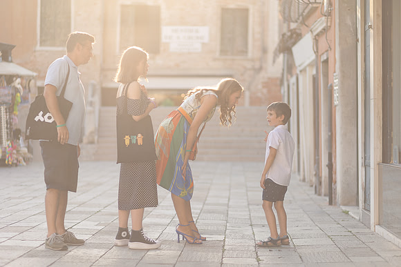 Family strolling through Venice.