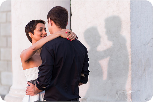 Looking into each other’s eyes with soft light on their faces