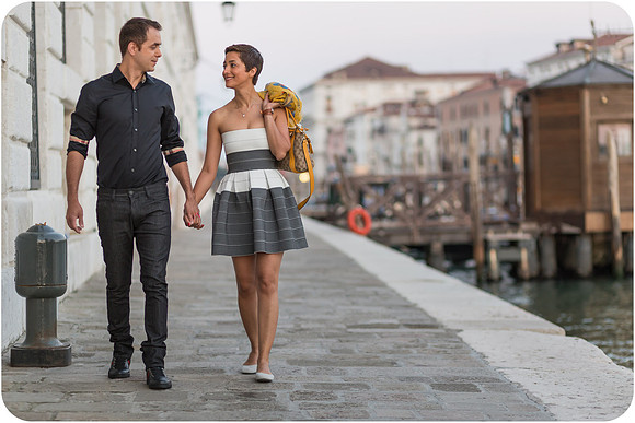 Walking together through quiet alleys during a sunrise photoshoot