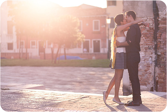 Artistic double exposure of couple on Venetian dock
