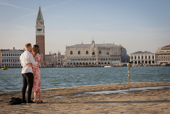 Engaged couple holding hands after proposal