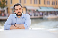 Stylish solo portrait on steps in Venice