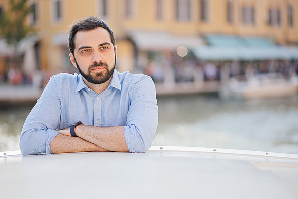 Stylish solo portrait on steps in Venice