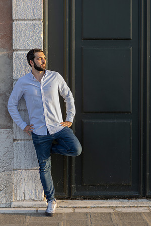 Man looking thoughtfully over Venice canals