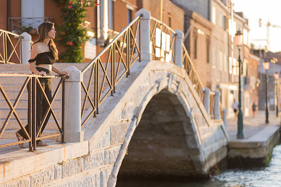 Bridge portrait, sunset stroll, Venice photography, warm hues.