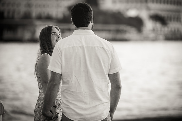 Engaged couple embracing at sunrise in Venice