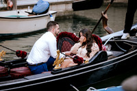 Couple kissing on gondola after engagement