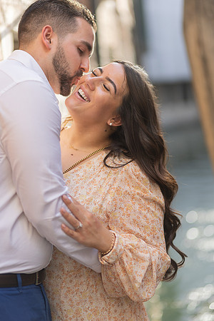 Couple embracing near Venice canal
