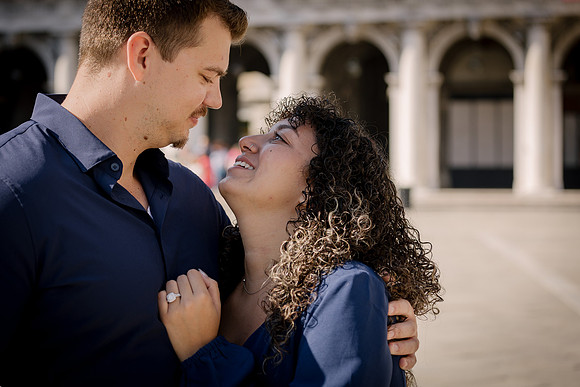 Quiet moment couple Venice proposal