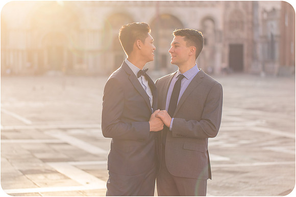 Couple dancing in the early morning light in Venice.
