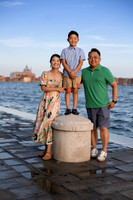 Family enjoying their time by the canals in Venice