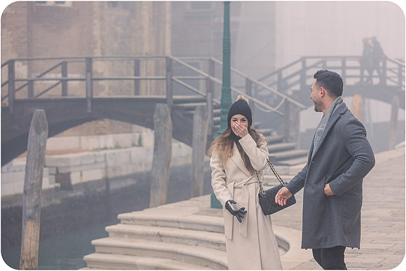 Strolling through misty Venice after engagement