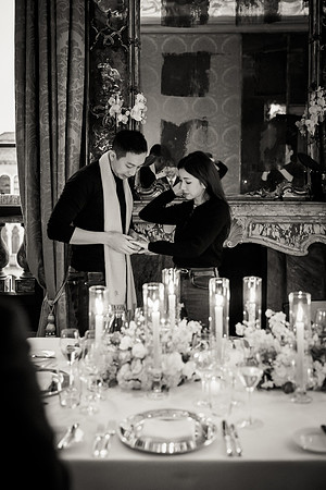 A bottle of champagne is poured to celebrate love and happiness.
