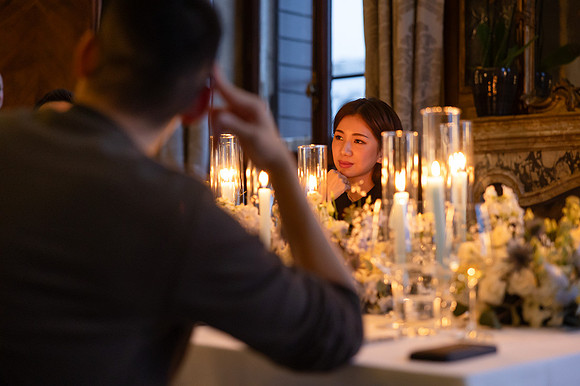 A warm, intimate dinner setting as the night winds down.