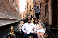 Mother enjoying a peaceful gondola ride through the Venetian canals