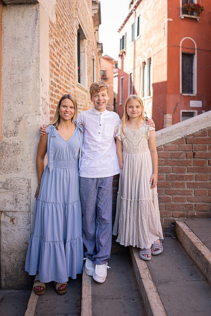 Three generations in a Venice alleyway