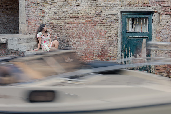 Woman enjoying view by Venice canal