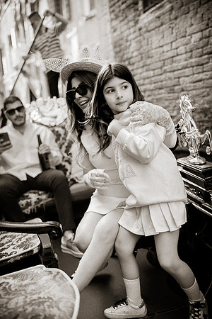 Daughter exploring the streets of Venice during a family vacation