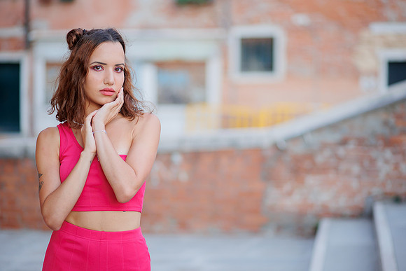 Model by a staircase in Venice.