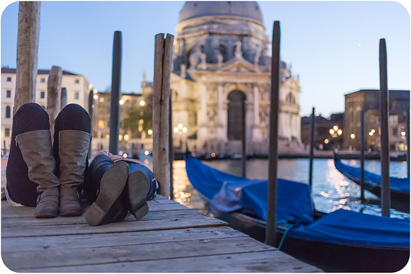 Couple enjoying the evening views of Venice during their same-sex honeymoon.