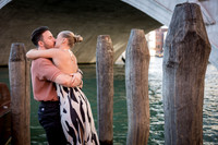 Embrace after proposal by Grand Canal in Venice