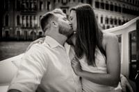 A joyful couple celebrating their love on a water taxi ride.