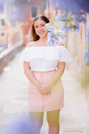 A portrait of a young girl enjoying the historic surroundings of Venice.