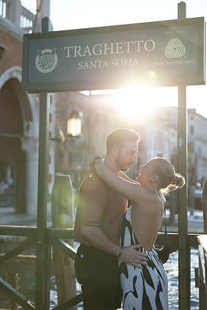 Warm embrace near gondola stop in Venice