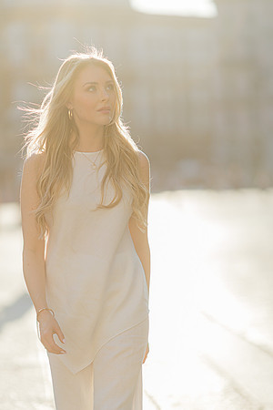 Solo portrait of woman enjoying the sun
