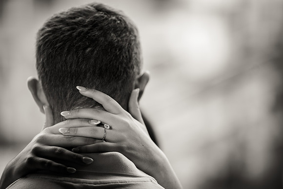 Silhouette of couple embracing during engagement shoot in Venice