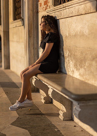 Sitting on steps during portrait session in Venice