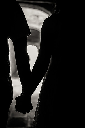 Close-up of couple holding hands during Venice engagement session