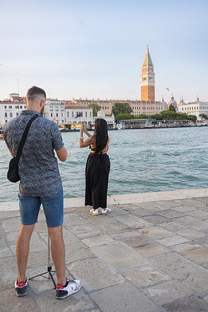 Surprise proposal at Punta della Dogana with view of Grand Canal and sunset.