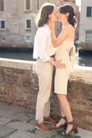Couple holding each other during engagement in Venice