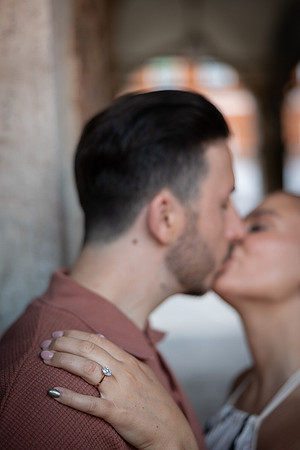 Standing alone in Venice street for engagement portrait