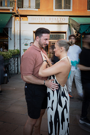 Embracing in Venice streets after proposal