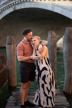 Kiss under Rialto Bridge after Venice proposal